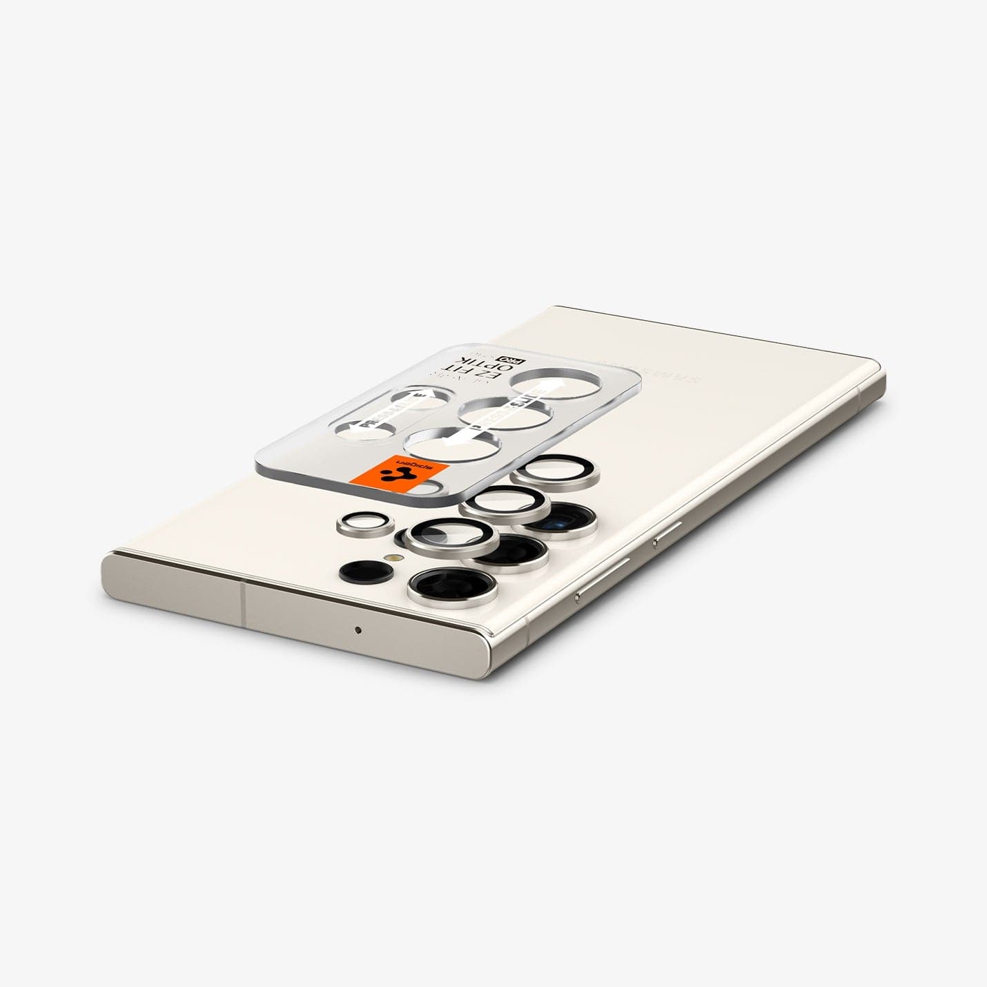 AGL06165 - Galaxy S23 Ultra EZ Fit Optik Pro Lens Protector in cream showing the device laying flat and ez fit tray hovering above