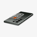 AGL06166 - Galaxy S23 Ultra EZ Fit Optik Pro Lens Protector in green showing the device laying flat and ez fit tray hovering above