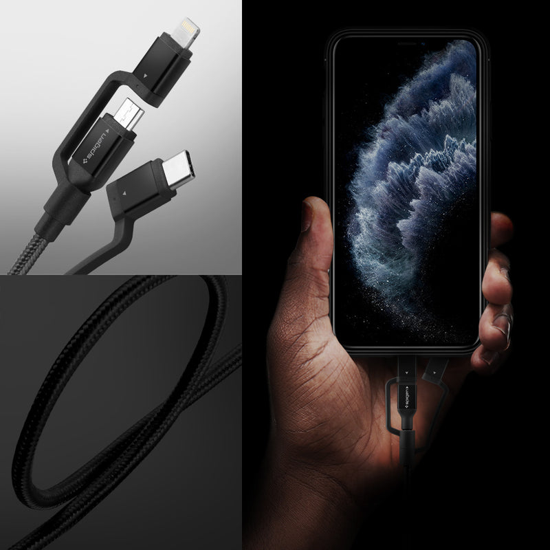 000CB22774 - DuraSync™ 3-in-1 Charger Cable C10i3 in Black showing the a hand holding a device while attached to a 3 in 1 cable charger