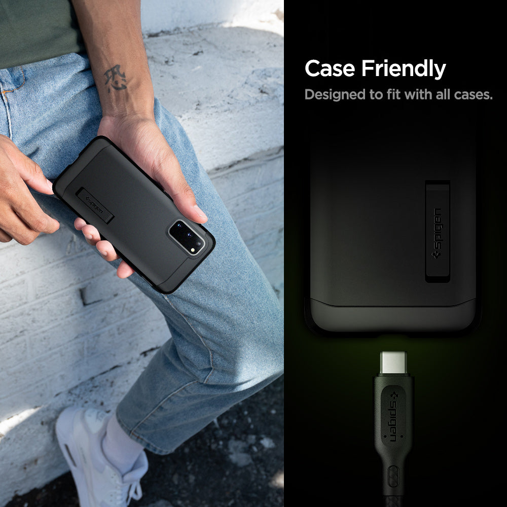 000CA25702 - DuraSync™ USB-C to USB-C 2.0 Cable C11C1 in Black showing the Case Friendly. Designed to fit with all cases. Showing half part of a device and a charging head pin hovering in front of a device charging port
