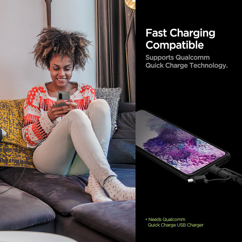 000CB22774 - DuraSync™ 3-in-1 Charger Cable C10i3 in Black showing the Fast Charging Compatible. Support Qualcomm Quick Charge Technology. (Needs Qualcomm Quick Charge USB Charger). A woman sitting while looking at the device attached from a longer cable wire