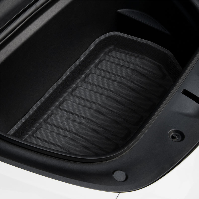 ACP06529 - Tesla Model Y Front Trunk Mat TL10-Y in Black showing the front and partial side installed in front of a car's trunk