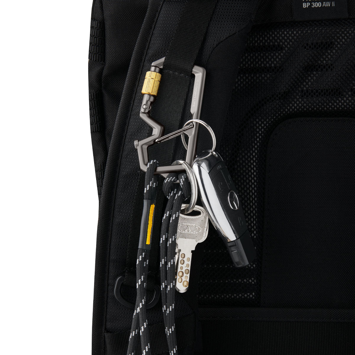 AHP08894 - Carabiner | LF101 in black showing the carabiner with keys  attached to the strap of the bag