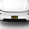 ACP12020 -  License Plate Frame | LP100 in White showing the front installed to the front of the car