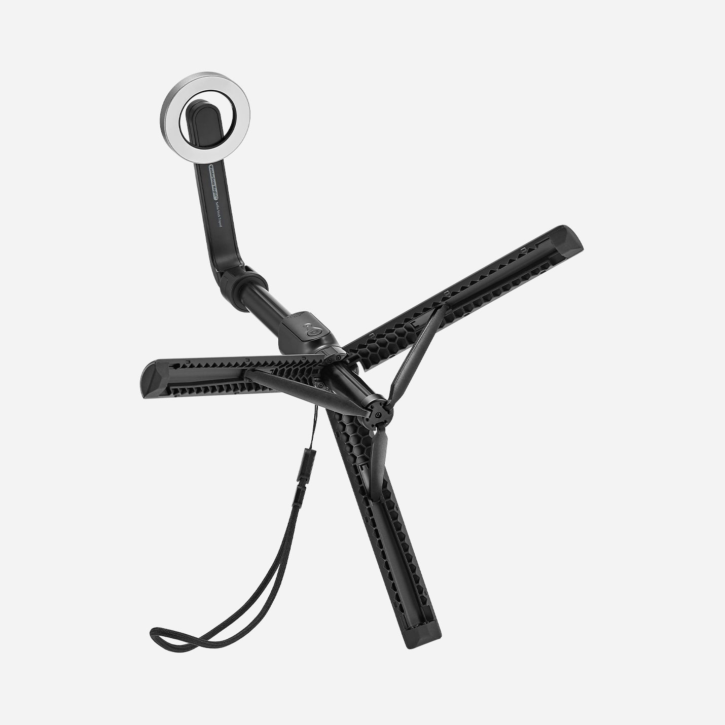 AMP07659 - Tripod Selfie Stick (Mag Fit) | S580W in Black showing the S580W selfie stick tripod in fully folded configuration with tripod legs spread open, MagSafe head attached, and wrist strap visible against a light gray background.