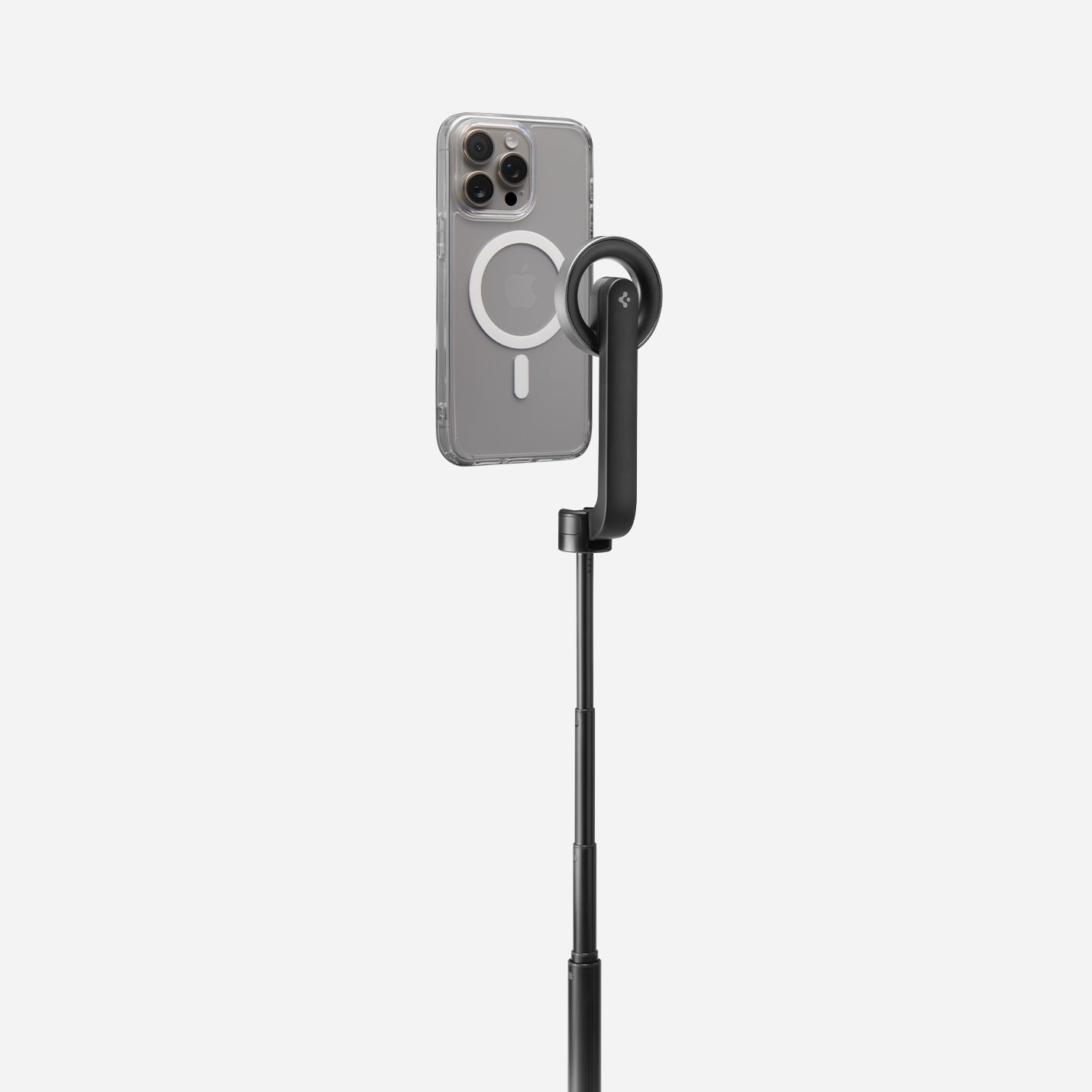 AMP07659 - Tripod Selfie Stick (Mag Fit) | S580W in Black showing an iPhone in a clear MagSafe case mounted to the S580W selfie stick in extended tripod mode, displayed against a light gray background.
