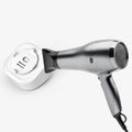 AMP09409 - Eero 6 Mount | ER110 in White showing applying heat to remove the bracket