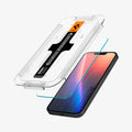 AGL03385 - iPhone 16e Plus Screen Protector EZ FIT GLAS.tR SLIM showing the front of the installation tray hovering in front of the screen protector and the device
