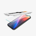 AGL03385 - iPhone 16e Plus Screen Protector EZ FIT GLAS.tR SLIM showing the installation tray hovering above the screen protector and the device