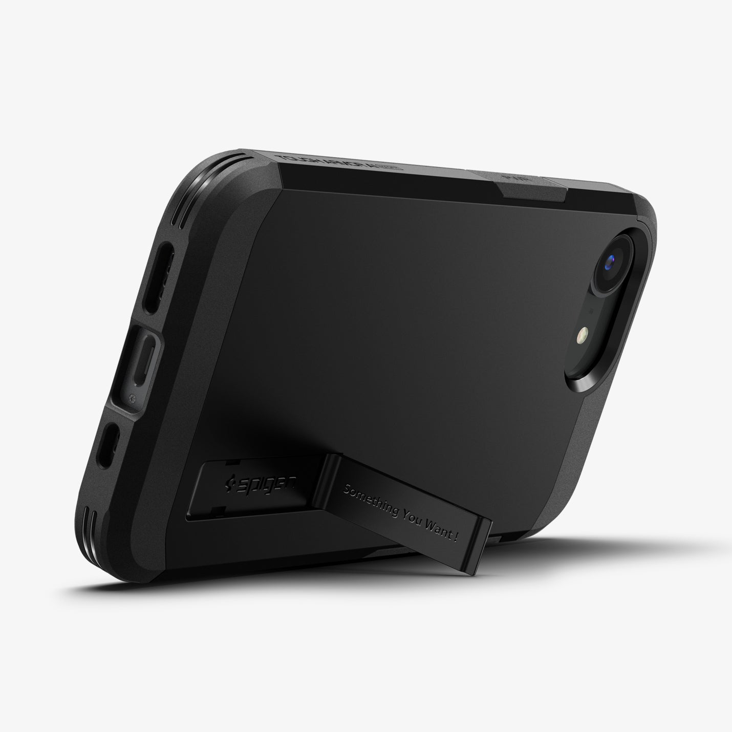 ACS09137 - iPhone 16e Case Tough Armor AI (MagFit) in Black showing the back, partial side and bottom with built-in kickstand propped up