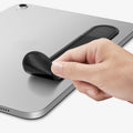 APP12219 - Apple Pencil Holder | LD222 Black showing the adhesive backing of the pencil holder being peeled from a tablet