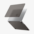 ACS11531 - MacBook Pro 13-inch Air Skin in Frost Black showing the top shell of the Frost Black case lifting away from the MacBook to illustrate the two-piece snap-on design