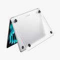 ACS11530 - MacBook Pro 13-inch Air Skin in Frost Clear showing the bottom exterior with four rubber feet and the Spigen logo visible on a white background