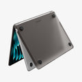 ACS11531 - MacBook Pro 13-inch Air Skin in Frost Black showing the bottom exterior with four rubber feet and the Spigen logo visible on a white background