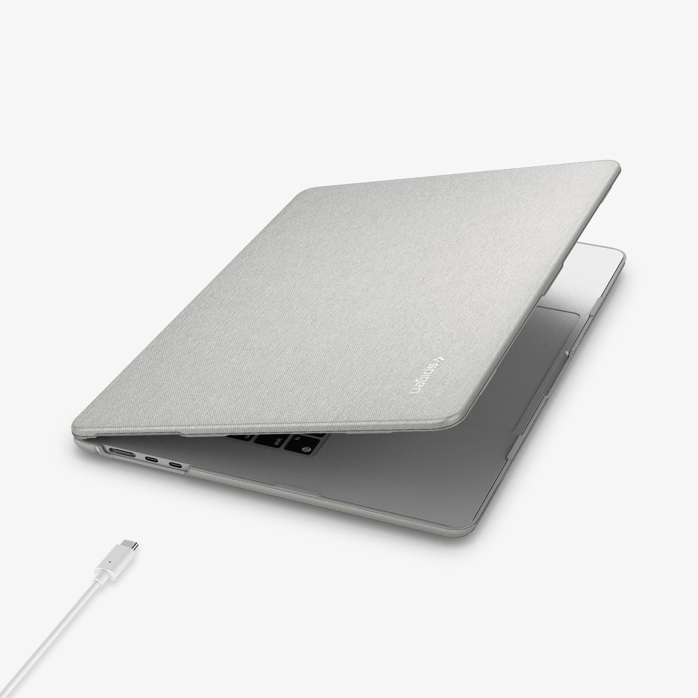 ACS10974 - MacBook Air 13-inch in Heather Gray showing the top and side with laptop slightly open and charging cable next to port