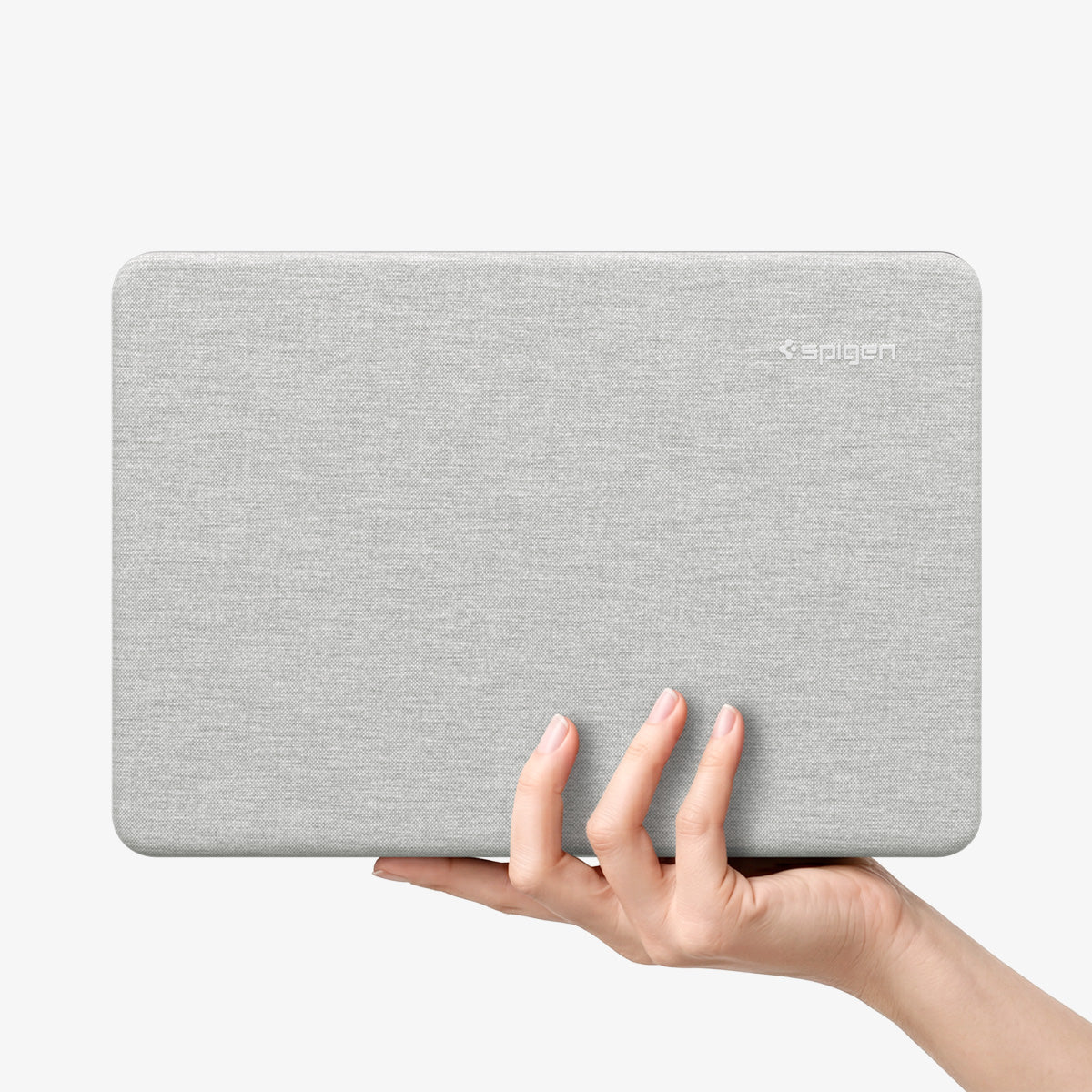 ACS11542 - MacBook Neo 13-inch Urban Fit in Heather Gray showing hand holding closed Urban Fit case in heather gray fabric