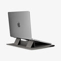 AFA06421 - Spigen Valentinus MacBook Sleeve built in stand supporting laptop at elevated typing angle