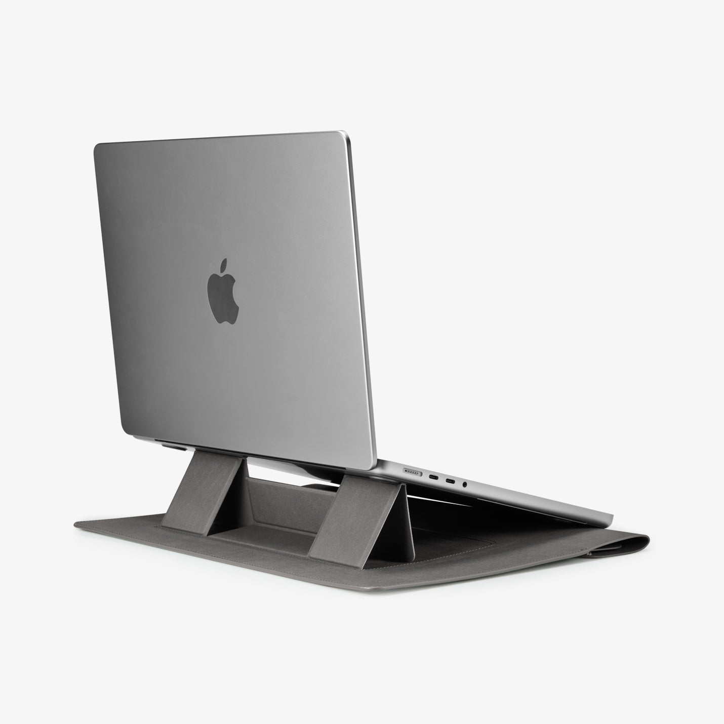 AFA06421 - Spigen Valentinus MacBook Sleeve built in stand supporting laptop at elevated typing angle