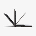 ACS11527 - MacBook Pro 16-inch Air Skin in Frost Black showing three MacBook units opened at different angles to demonstrate the case allows full range of motion beyond 90 degrees