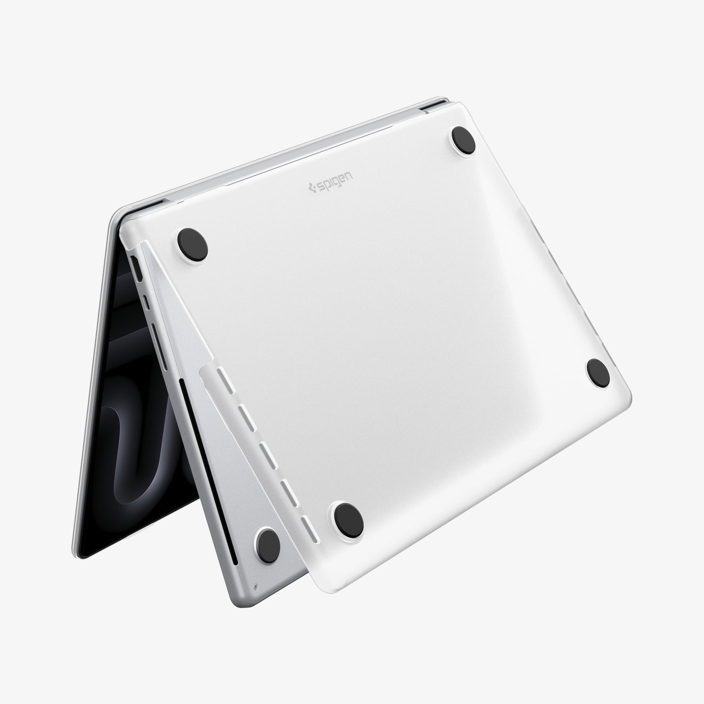 ACS11526 - MacBook Pro 16-inch Air Skin in Frost Clear showing the bottom exterior with four rubber feet and the Spigen logo visible on a white background