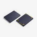 ACS11271 - MacBook Pro 14-inch Nano Pop Blueberry Navy showing top and bottom views of the closed laptop case with raised feet