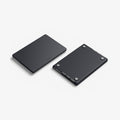 ACS11272 - MacBook Pro 14-inch Nano Pop Black Sesame showing top and bottom views of the closed laptop case with raised feet