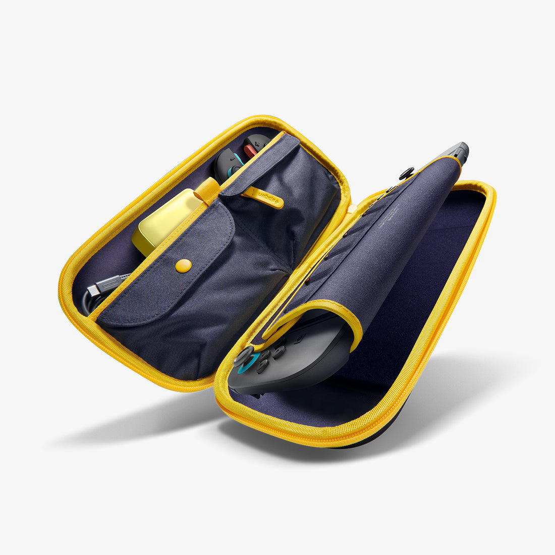 AGP09565 - Nintendo Switch 2 Nano Pop Pro Blueberry Navy showing the inner with multiple items inside