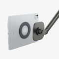 AMP09191 - OneTap Clamp in Space Gray showing the back hovering in front of the device back