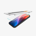 AGL08938 - Pixel 9a GLAS.tR EZ Fit in Clear showing partial front of the tray hovering above the screen protector and the device