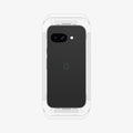 AGL08938 - Pixel 9a GLAS.tR EZ Fit in Clear showing the back of the device with tray attached in front partially showing its sides