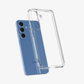 ACS08985 - Galaxy S25 Plus Case Ultra Hybrid in Crystal Clear showing the back, partial side and bottom hovering in front of the device
