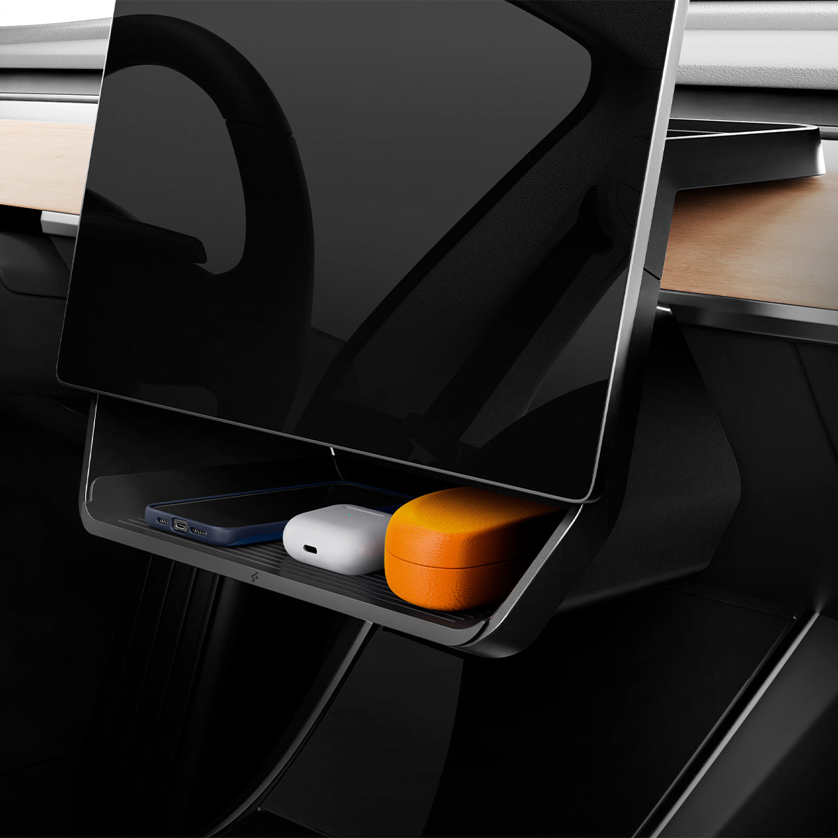 ACP07280 - Tesla Model Y & 3 Under Screen Organizer TO227 in Black showing the front of the device attached to the organizer with accessories and devices inside