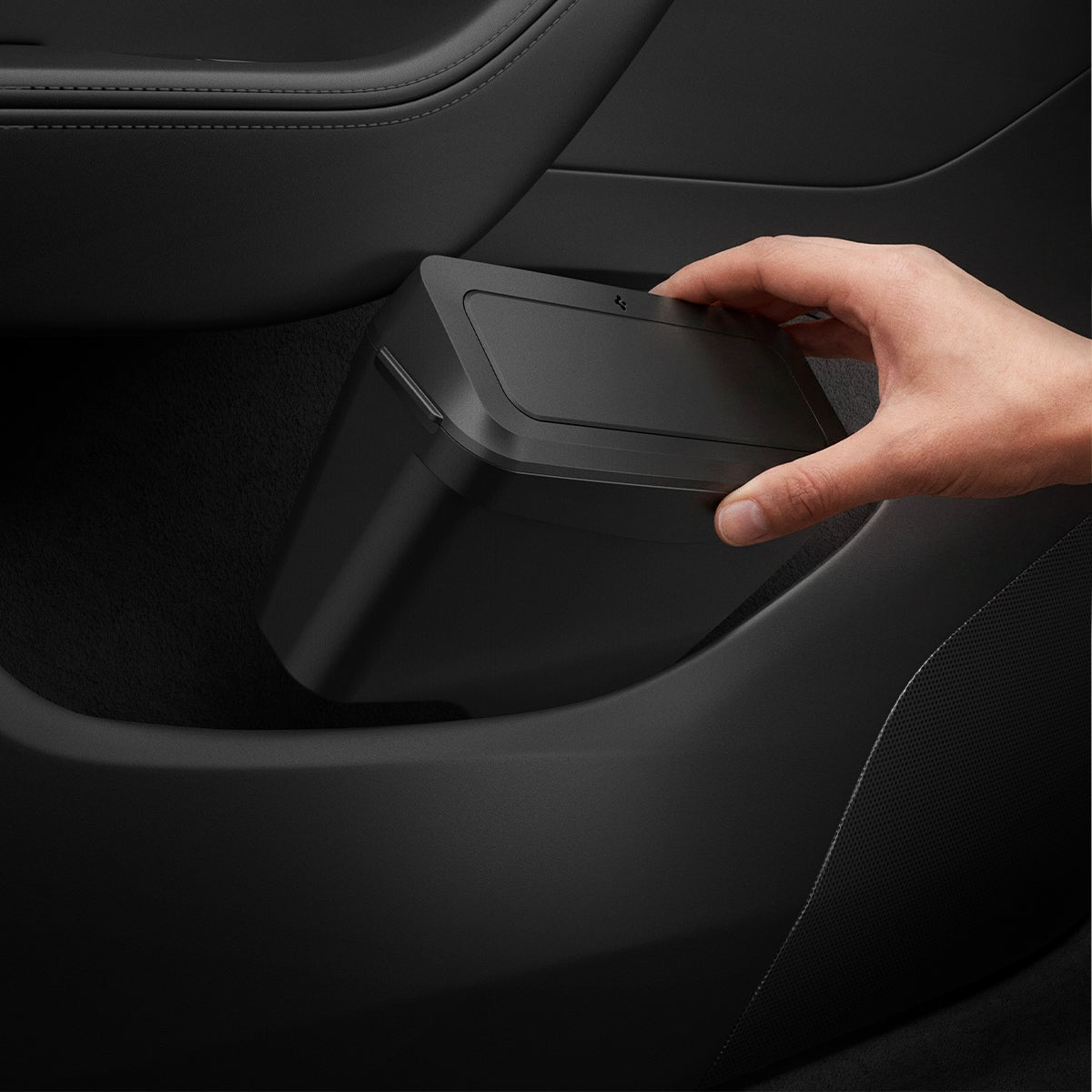 ACP11106 - Tesla Series - Car Trash Can | TO281J showing a hand lifting the compact trash can from the Tesla door storage pocket for easy removal and cleaning.