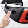 AFL07503 - Tesla Model Y & 3 Charging Port Protective Film TO420C in Black showing the cleaning process using wipes