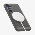 ACS08978 - Galaxy S25 Plus Case Rugged Armor (MagFit) in Marble Gray showing the back, partial side and bottom with magsafe charger attached