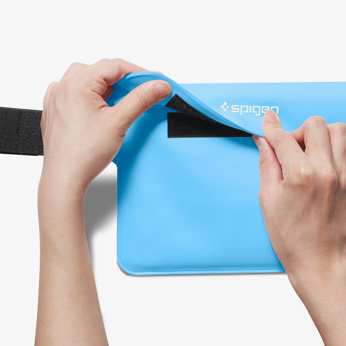 AMP06020 - AquaShield Waterproof Waist Bag (2 Pack) A620 in Sea Blue showing the third step in closing the bag using the built-in velcro tape attached