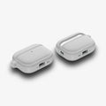 ACS11144 - AirPods Pro 3 Classic Fit case dual angle view highlighting bottom charging port cutout, speaker openings, and textured fabric finish in heather gray
