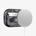 ACS09823 - AirPods Pro 3 Series Ultra Hybrid Zero One (MagFit) in Zero One Black showing back with magsafe charger hovering away from AirPods