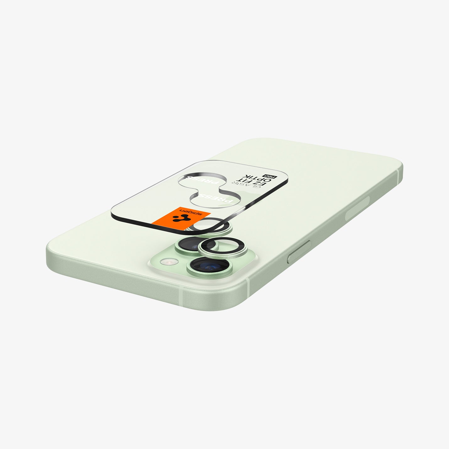 AGL07169 - iPhone 15 Plus Optik Pro EZ Fit Lens Protector in Green showing the optic tray hovering above the lens and the device showing back and partial side