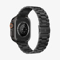 AMP11577 -  Apple Watch Series - Modern Fit Titanium Black angled rear view highlights the titanium links and folding buckle design.