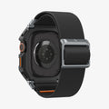 ACS11415 - Three-quarter back view of Spigen Lite Fit Pro Apple Watch Ultra case showing sensor cutout and nylon band with metal clasp and orange stitching
