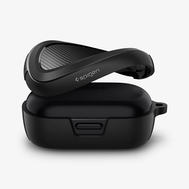 ASD02487 - Bose Earbuds Quiet Comfort Case Rugged Armor in black showing the top of case bending and hovering above the earbuds