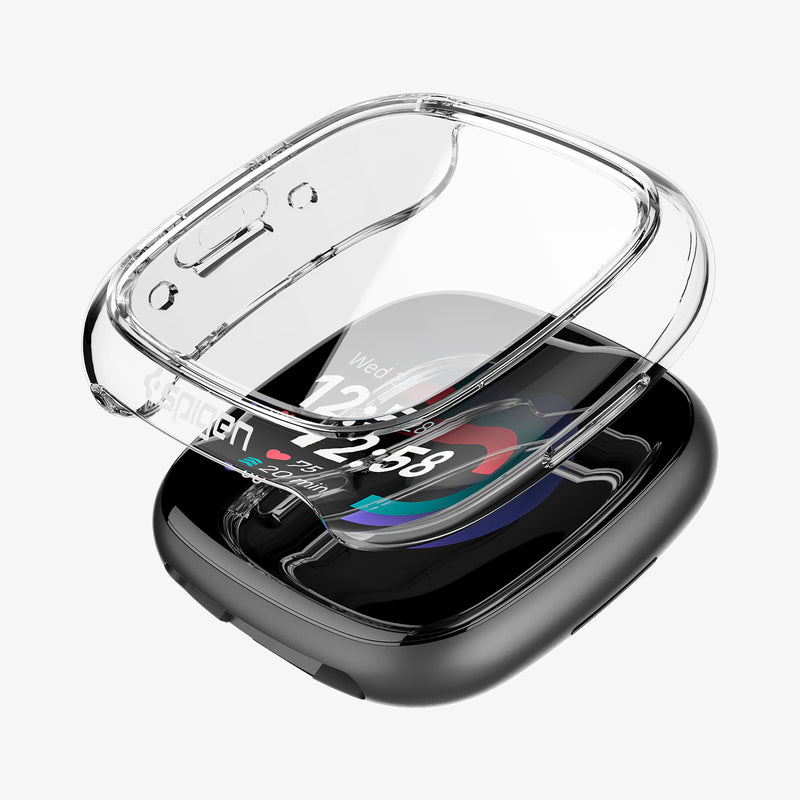 ACS05297 - Fitbit Series Case Ultra Hybrid in crystal clear showing the case hovering above the watch face