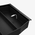 ACP08900 - Ford Armrest Console Organizer | FO220 in Black showing the partial side and inner focusing on the usb cable inserted in the cable cutout