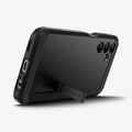 ACS07242 - Galaxy A15 5G Case Tough Armor in Black showing the back, partial side and bottom with a built-in kickstand propped up