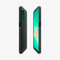 ACS09290 - Galaxy A26 5G Case Liquid Air in Matte Black showing the partial back, front and sides of both devices facing each 