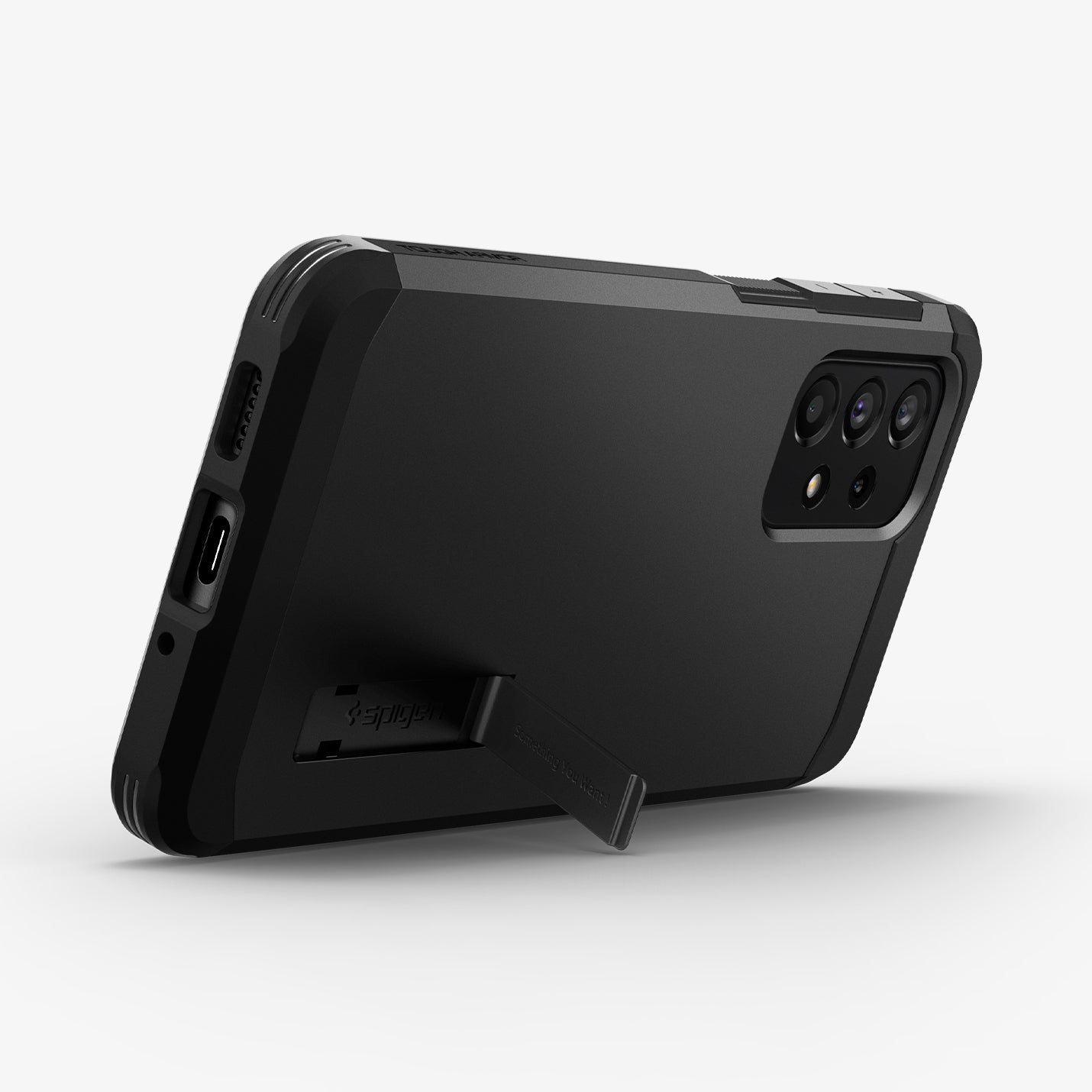 ACS04319 - Galaxy A33 5G Case Tough Armor in Black showing the back, partial bottom with a built-in kickstand propped up