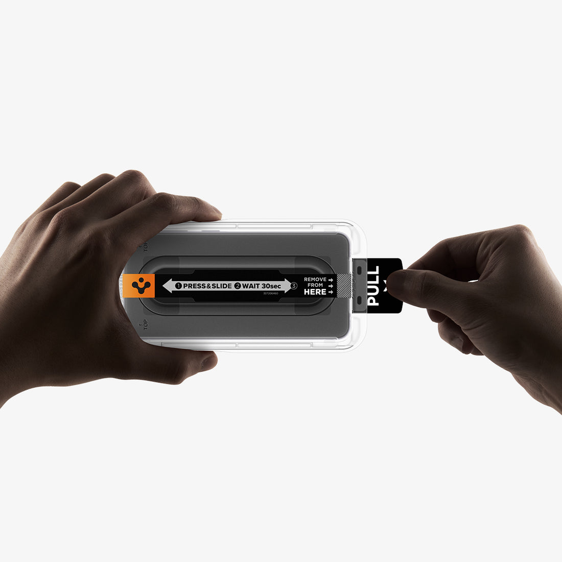 AGL11397 - Hands demonstrating step one of Spigen EZ Fit Pro Galaxy A57 5G screen protector installation pulling tab