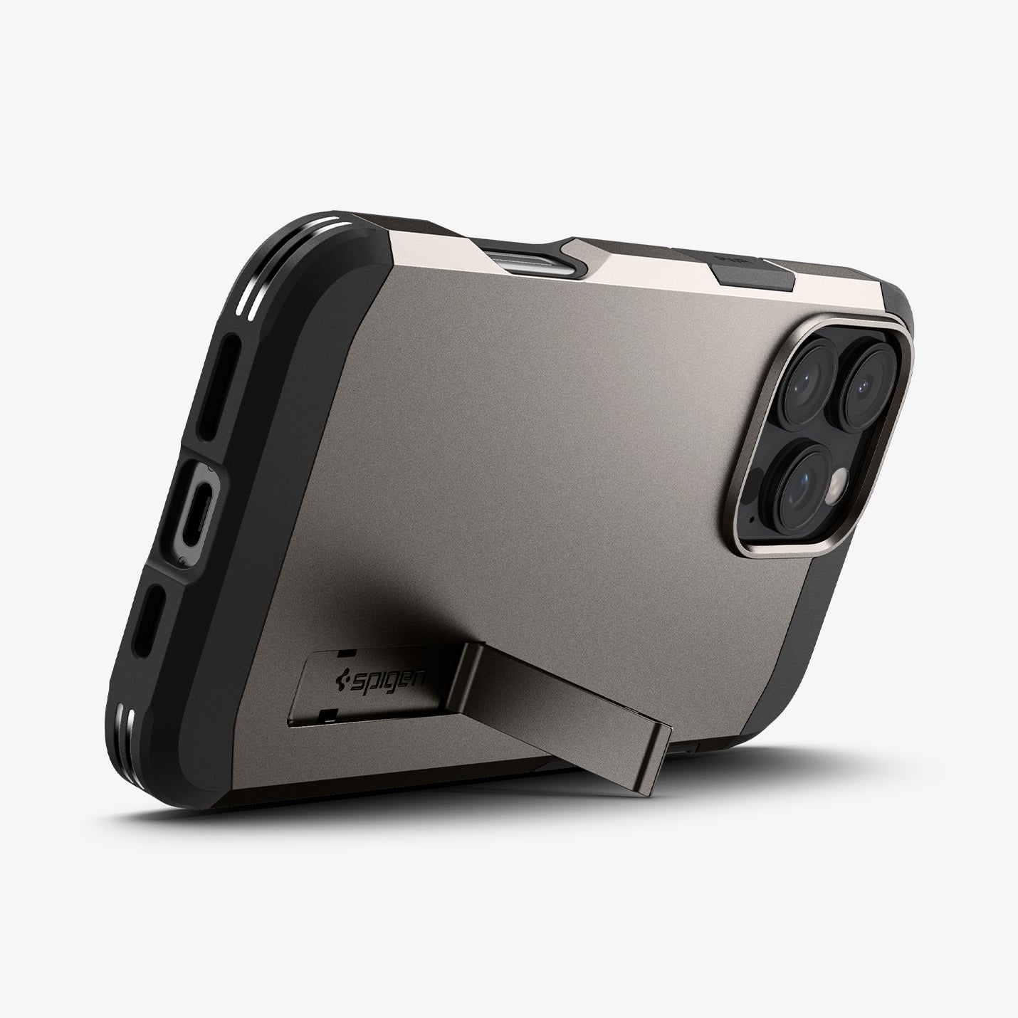 ACS08012 - iPhone 16 Pro Max Case Tough Armor AI (MagFit) in Gunmetal showing the back, partial side and bottom with built-in kickstand propped up