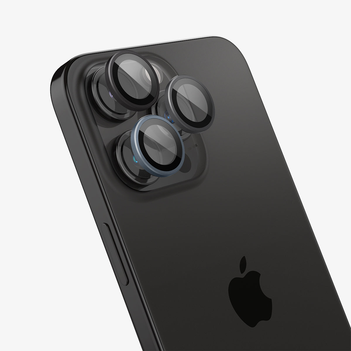AGL06159 - iPhone 15 Pro / 15 Pro Max Optik Pro Lens Protector in zero one showing the lens protector hovering slightly in front of the camera lens